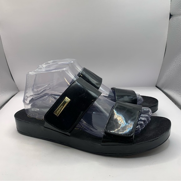 Calvin Klein Shoes - Calvin Klein patent leather size 9 black Myra slip on summer sandals